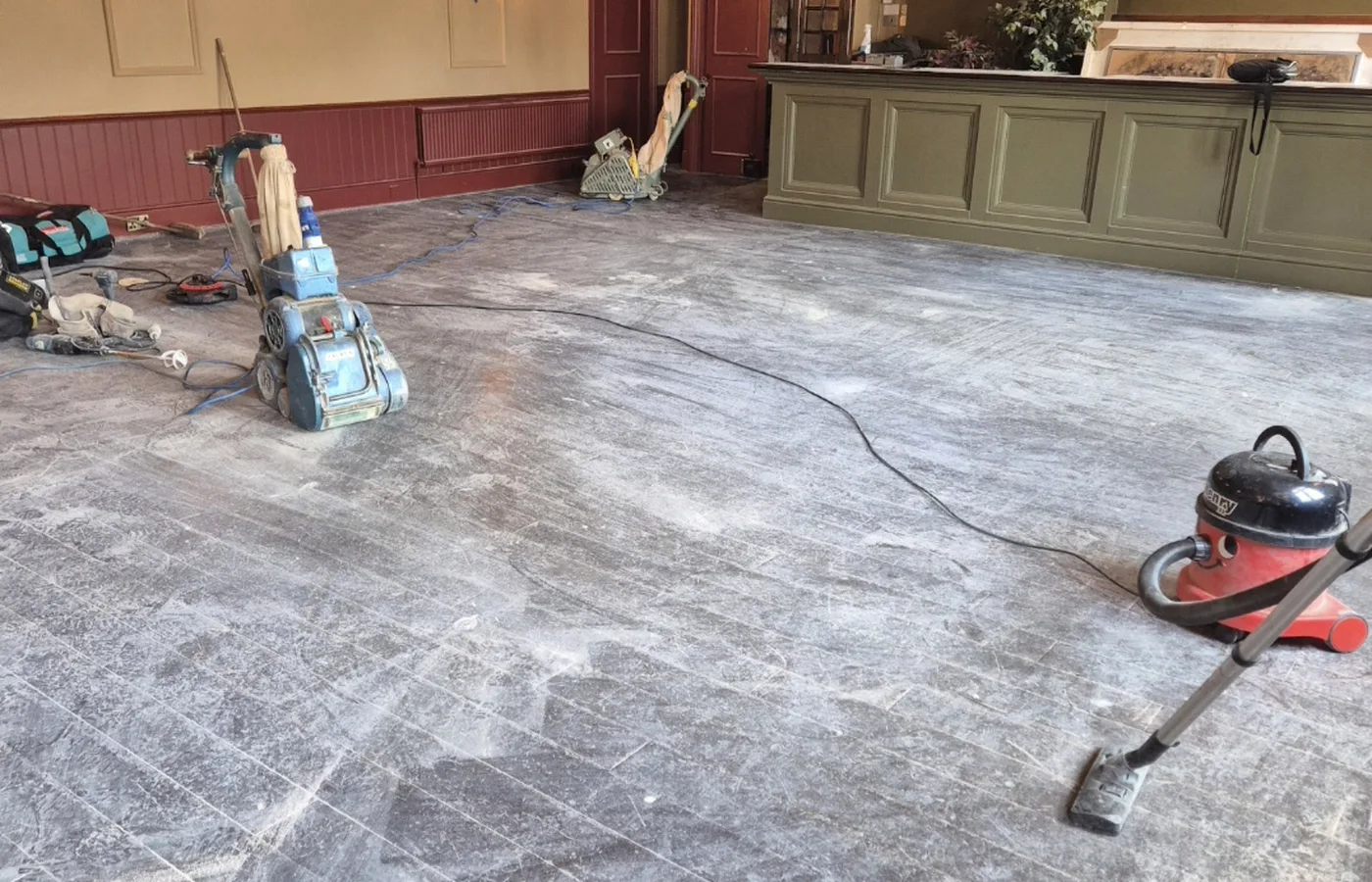 Worn timber floor before sanding